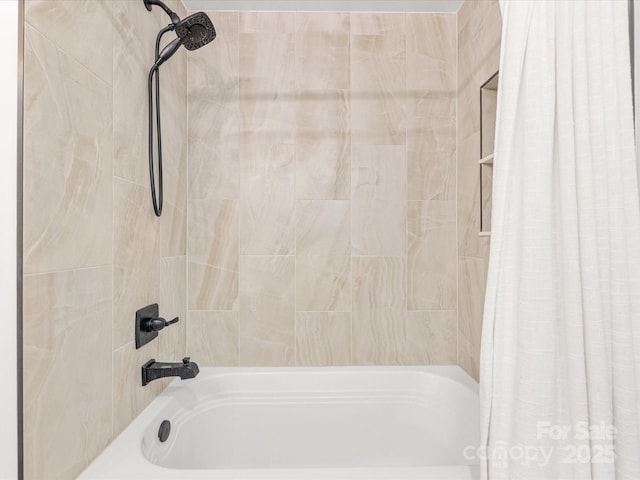 full bathroom featuring shower / tub combo with curtain