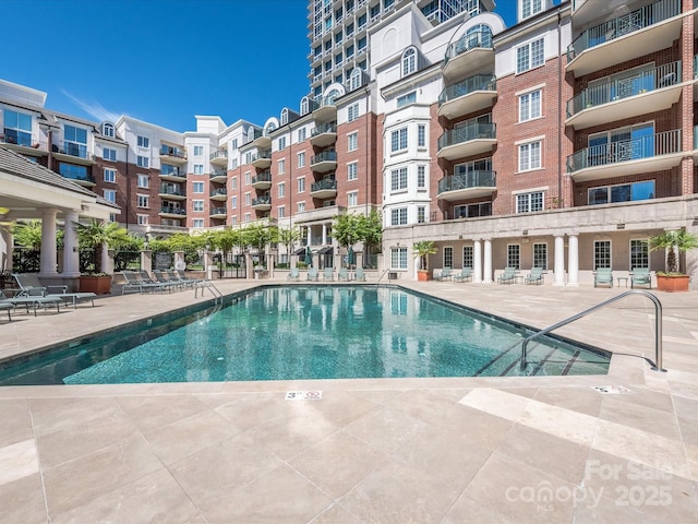 pool with a patio