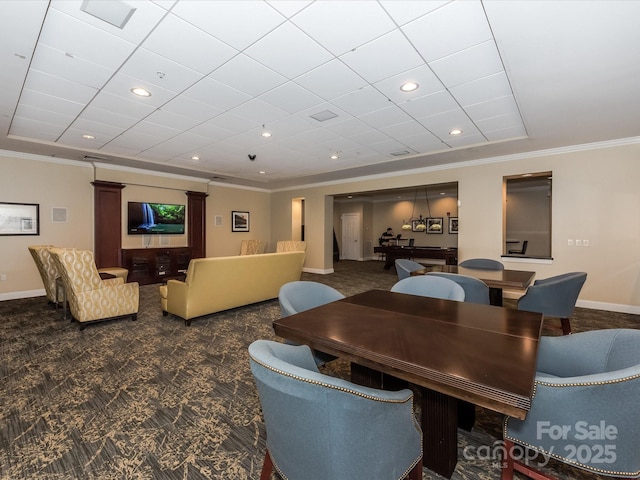 dining area with carpet floors, recessed lighting, a raised ceiling, ornamental molding, and baseboards