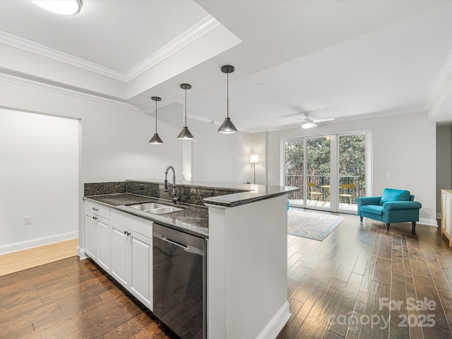 kitchen featuring dark wood finished floors, ornamental molding, open floor plan, stainless steel dishwasher, and a sink