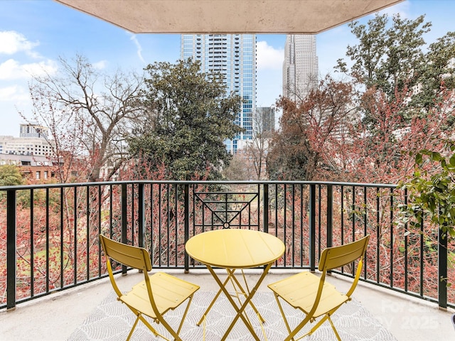 balcony featuring a city view