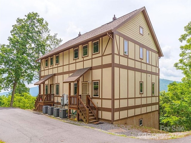 view of front of house with roof with shingles