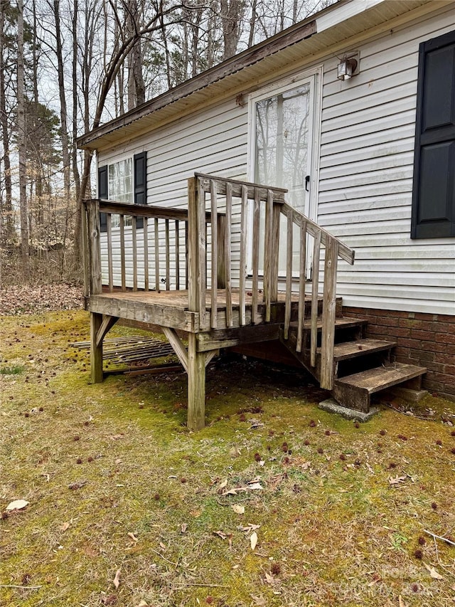 deck featuring a yard