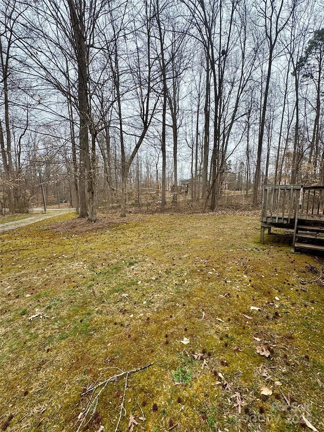 view of yard with a deck