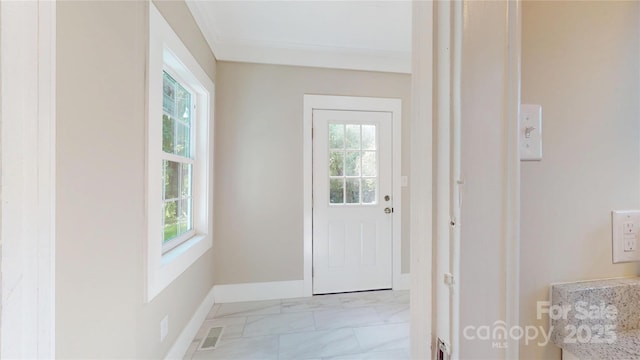 entryway with baseboards, visible vents, plenty of natural light, and marble finish floor