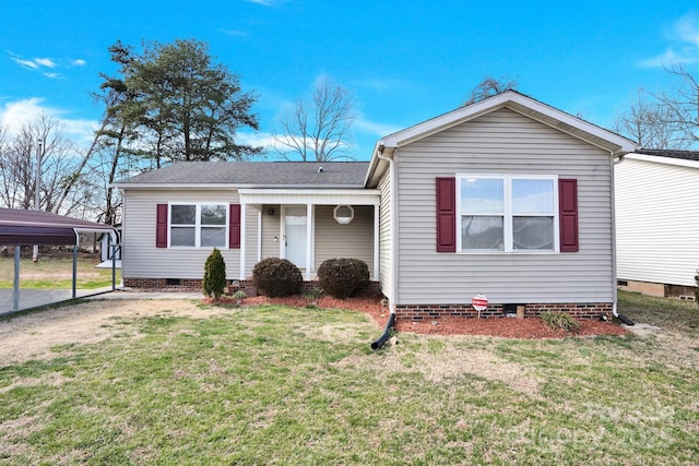 ranch-style house with crawl space, a front lawn, a carport, and roof with shingles