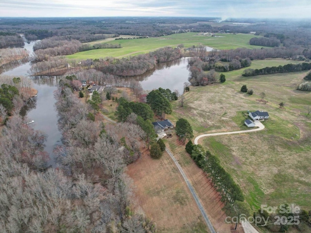 aerial view with a rural view and a water view