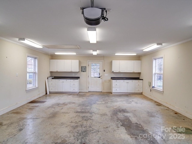 garage with baseboards