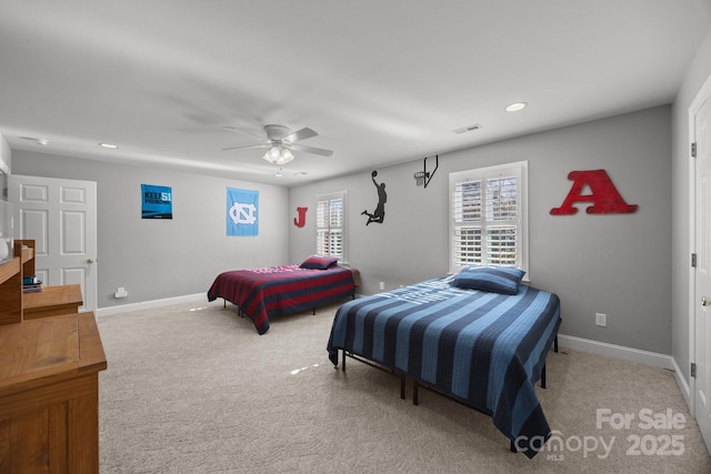 carpeted bedroom featuring visible vents, baseboards, a ceiling fan, and recessed lighting