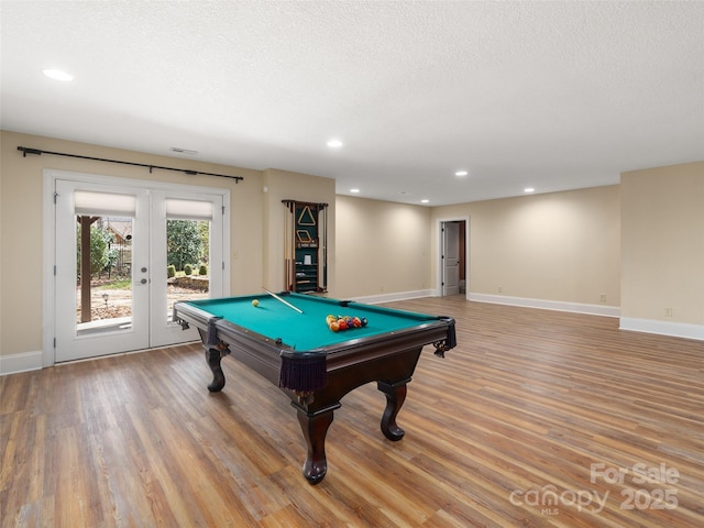 playroom featuring light wood-type flooring, french doors, baseboards, and recessed lighting