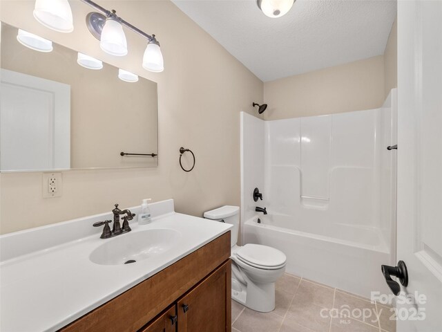 full bath with shower / bath combination, toilet, a textured ceiling, vanity, and tile patterned floors