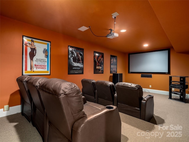 carpeted cinema with recessed lighting and baseboards