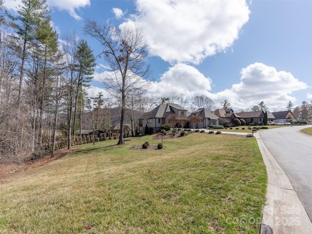 view of yard with a residential view