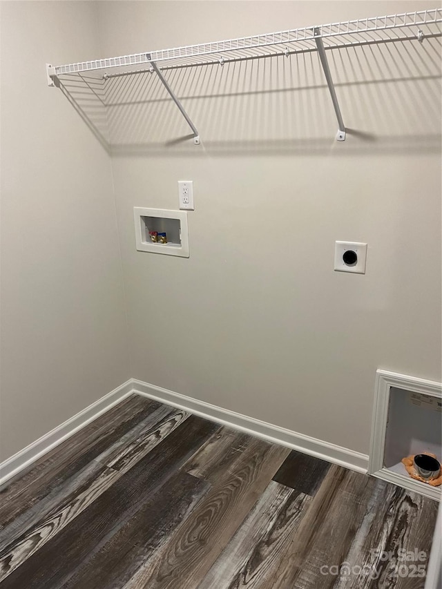 clothes washing area with wood finished floors, baseboards, hookup for an electric dryer, hookup for a washing machine, and laundry area