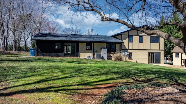 view of front of house with brick siding and a front yard