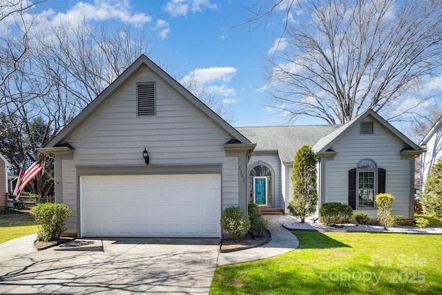 single story home featuring a garage, driveway, a shingled roof, and a front lawn