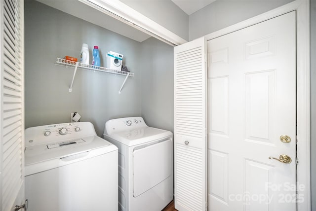 laundry area featuring laundry area and washing machine and clothes dryer