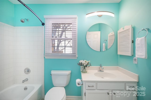 full bathroom with shower / bathing tub combination, vanity, and toilet