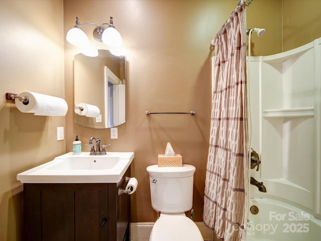 full bath with vanity, toilet, and shower / tub combo with curtain