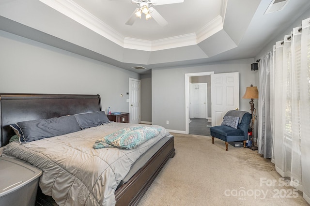12723 Willingdon Rd, Huntersville, NC 28078 - bedroom featuring a tray ceiling, crown molding, light carpet, baseboards, and visible vents