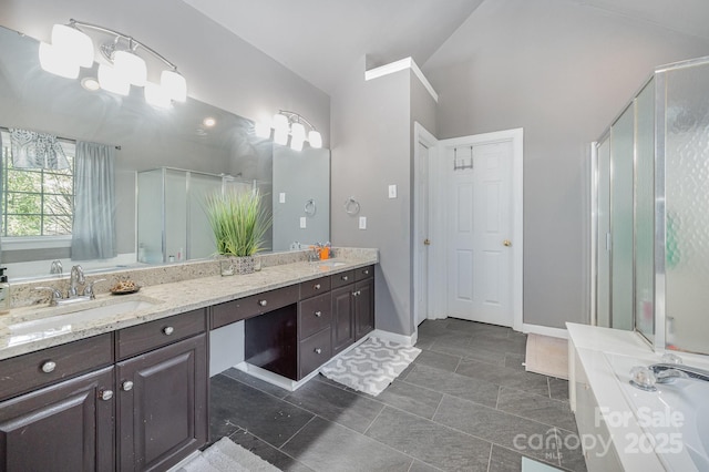 12723 Willingdon Rd, Huntersville, NC 28078 - bathroom featuring double vanity, a sink, baseboards, and an enclosed shower