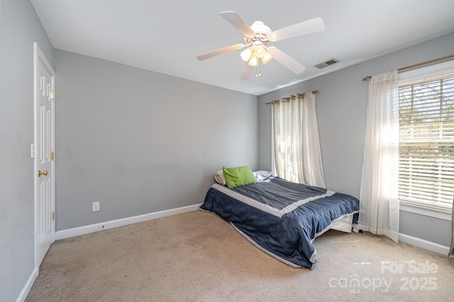 12723 Willingdon Rd, Huntersville, NC 28078 - carpeted bedroom with baseboards, visible vents, and a ceiling fan