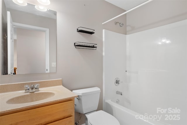 full bath with vanity,  shower combination, and toilet