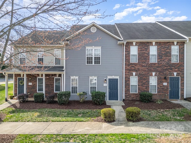 multi unit property featuring brick siding