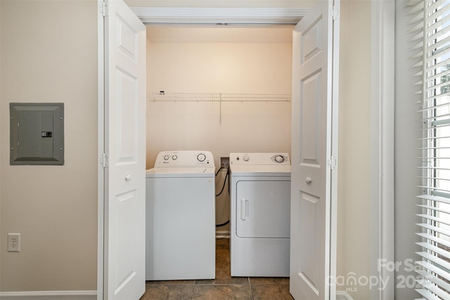 laundry area featuring electric panel, laundry area, and independent washer and dryer