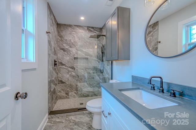 bathroom with toilet, recessed lighting, visible vents, vanity, and a tile shower