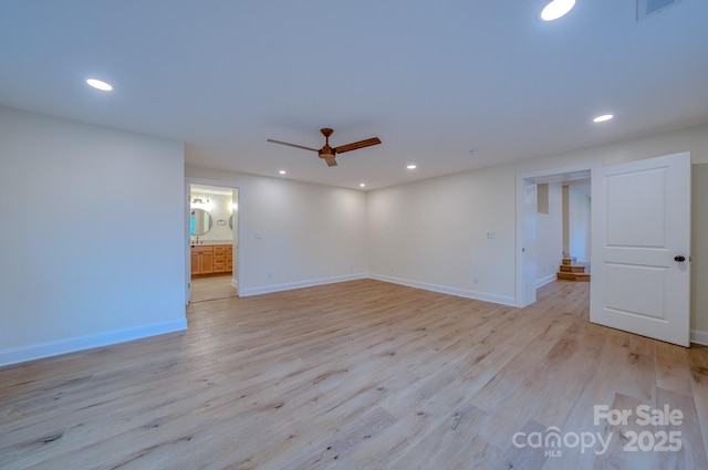 spare room with recessed lighting, visible vents, baseboards, a ceiling fan, and light wood-type flooring