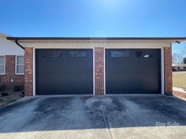 garage with driveway