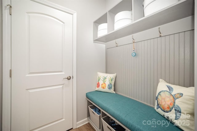 mudroom with light wood finished floors