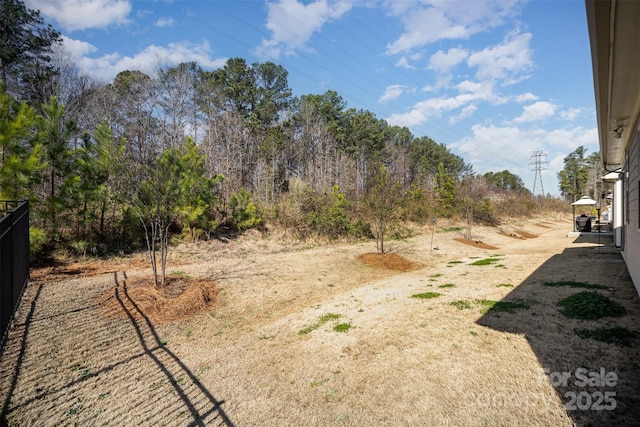 view of yard with fence