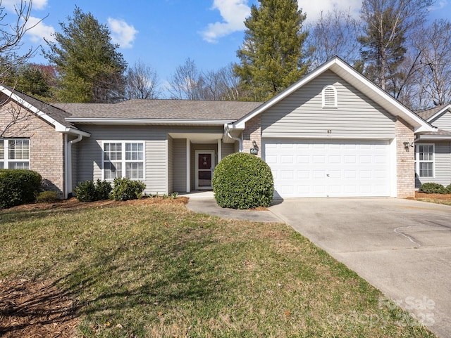 ranch-style house with a front yard, roof with shingles, concrete driveway, a garage, and brick siding