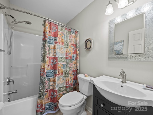 full bathroom featuring toilet, vanity, and shower / bath combination with curtain