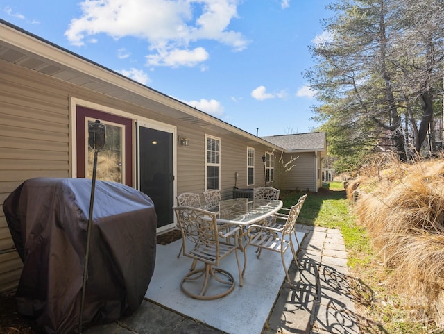 view of patio / terrace featuring area for grilling and outdoor dining space