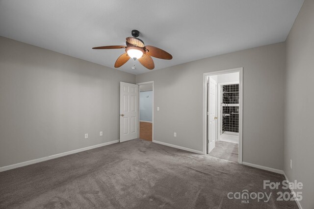 68 Wiltshire Cir, Fletcher, NC 28732 - unfurnished bedroom featuring carpet floors, baseboards, a ceiling fan, and ensuite bath