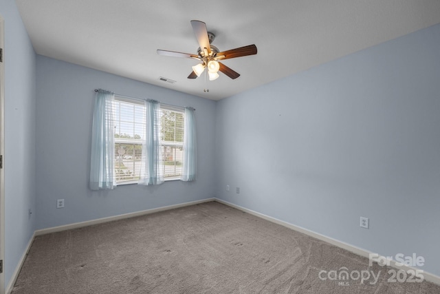 68 Wiltshire Cir, Fletcher, NC 28732 - carpeted spare room with ceiling fan and baseboards