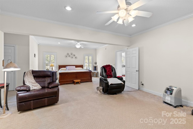 carpeted bedroom with crown molding, ceiling fan, recessed lighting, and baseboards