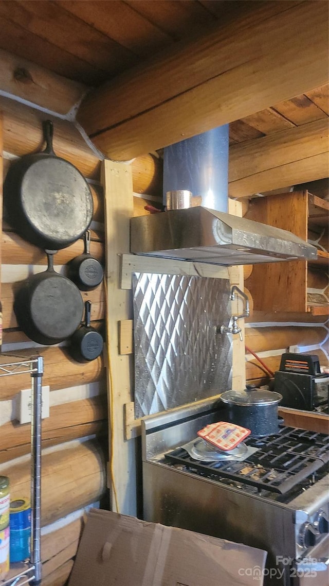 room details featuring extractor fan and rustic walls