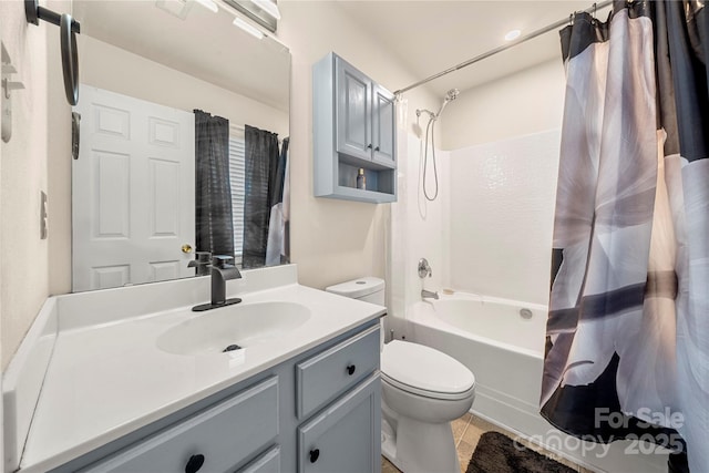 full bathroom with tile patterned floors, vanity, toilet, and shower / bath combo with shower curtain