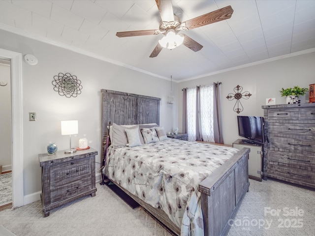 bedroom featuring crown molding, light colored carpet, baseboards, and ceiling fan