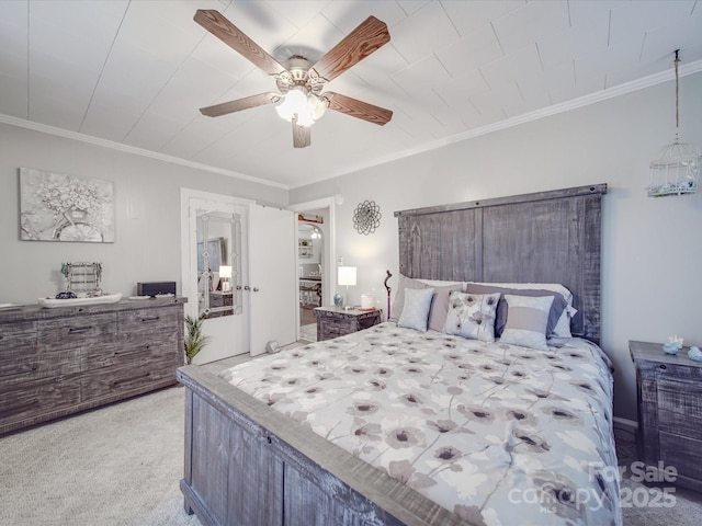 carpeted bedroom with crown molding and a ceiling fan