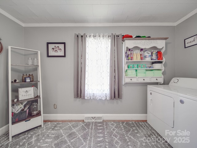 washroom with visible vents, independent washer and dryer, a healthy amount of sunlight, and laundry area
