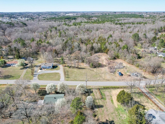 birds eye view of property featuring a rural view