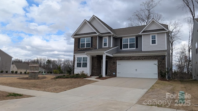 view of front facade with driveway, brick siding, board and batten siding, and an attached garage