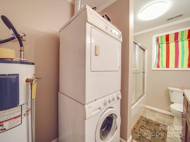 laundry area with visible vents, stacked washer and dryer, electric water heater, crown molding, and laundry area