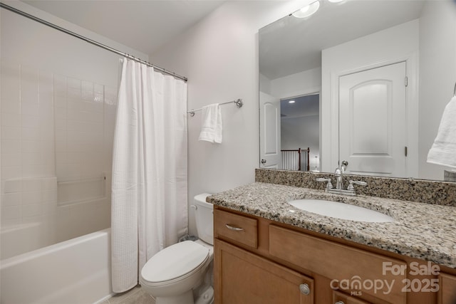 full bathroom with vanity, toilet, and shower / bath combo