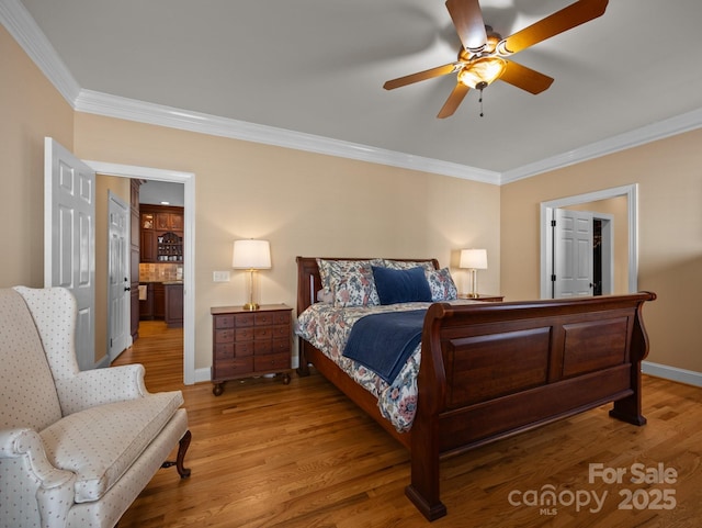 bedroom featuring ceiling fan, light wood-style flooring, baseboards, and ornamental molding